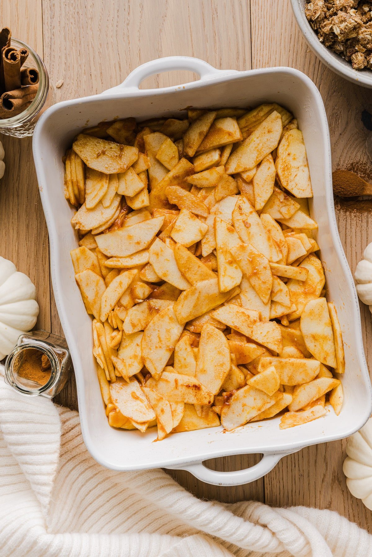 Apple pumpkin crisp mixture in a baking dish.