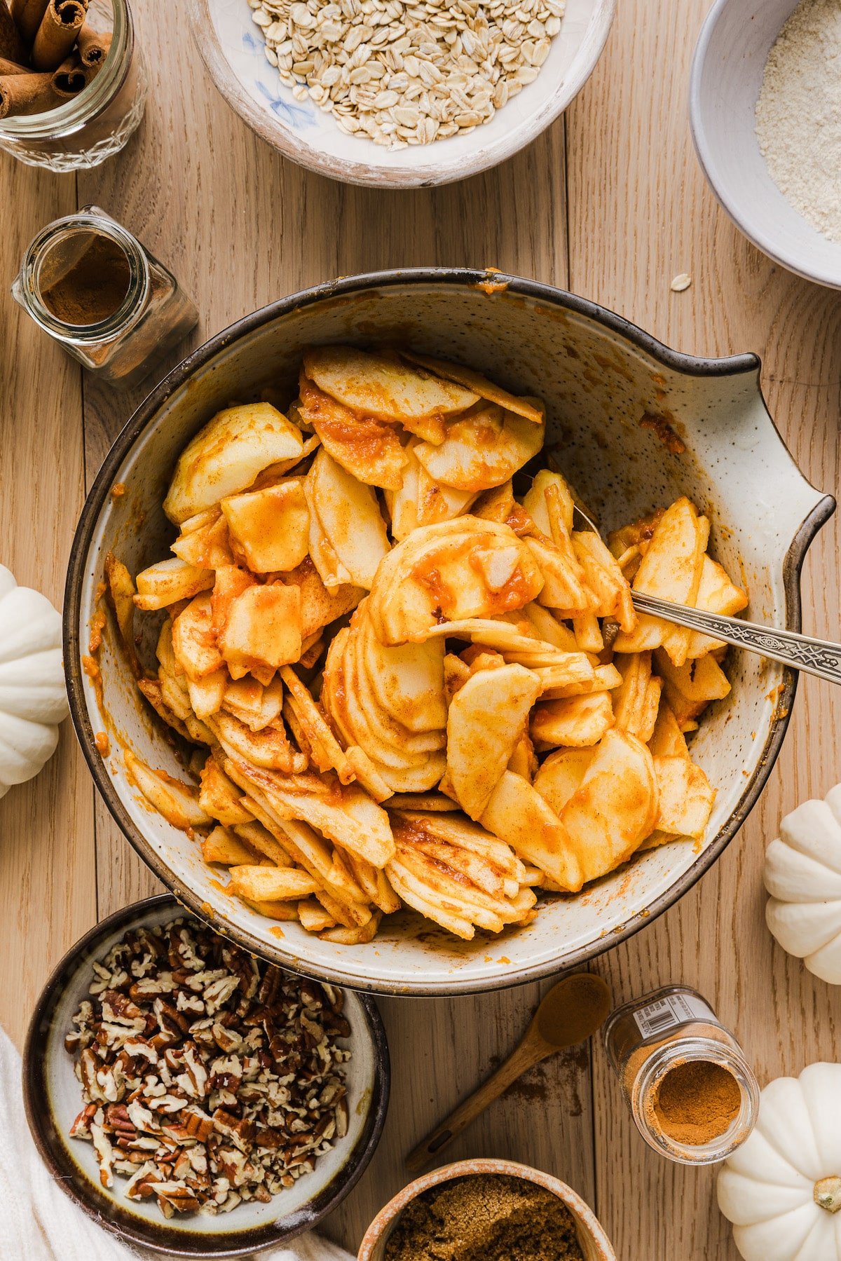 Apple pumpkin crisp filling mixed in a bowl.