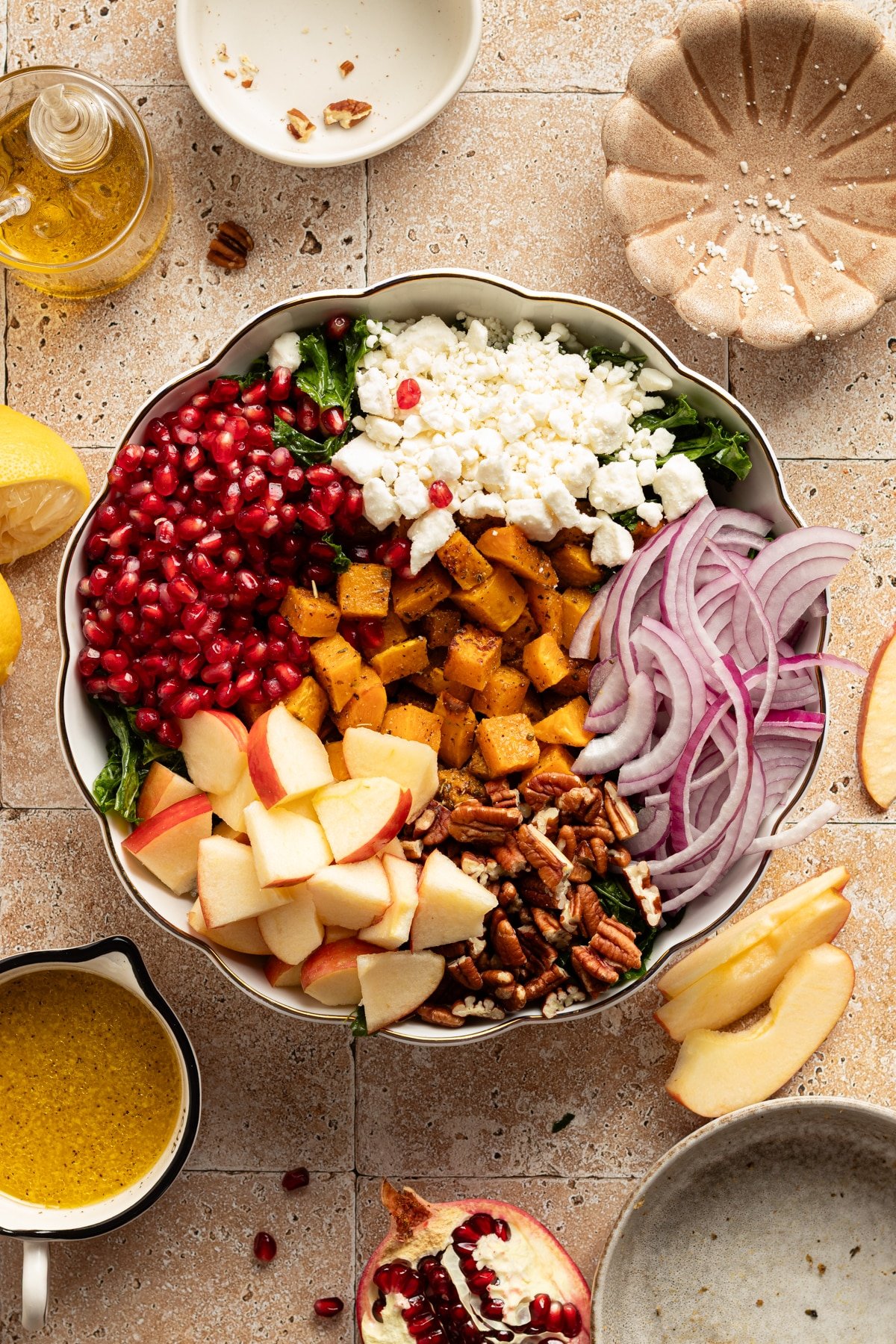 All ingredients for kale butternut squash salad in a large serving bowl.