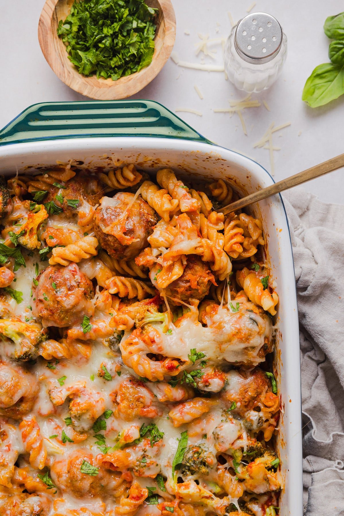 This dump and bake meatball casserole is easy, family-friendly and super simple. Throw your ingredients in a dish, and bake! Dump and bake casserole with melted mozzarella on top.