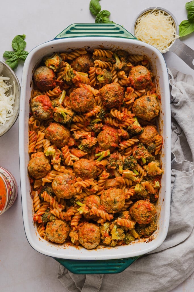 This dump and bake meatball casserole is easy, family-friendly and super simple. Throw your ingredients in a dish, and bake! Baked dump and bake meatball casserole in a baking dish.
