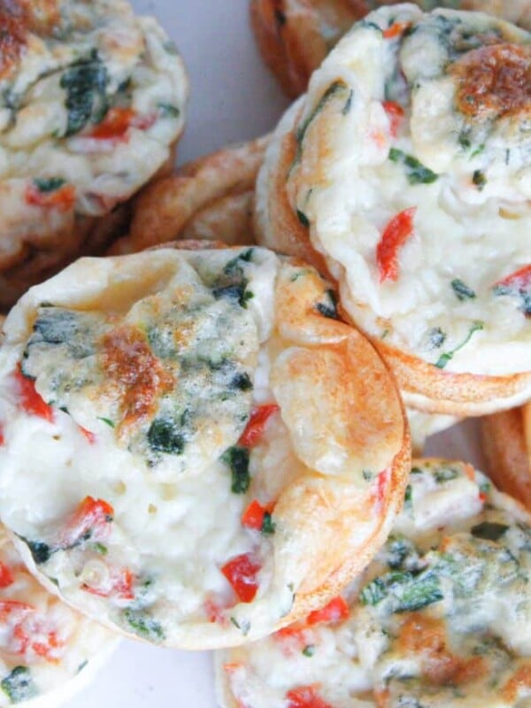 Roasted red pepper egg bites arranged on a plate.