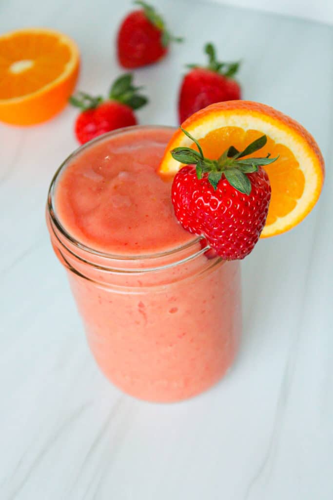 https://thebalancednutritionist.com/wp-content/uploads/2023/02/sunrise-sunset-tropical-smoothie-683x1024.jpg