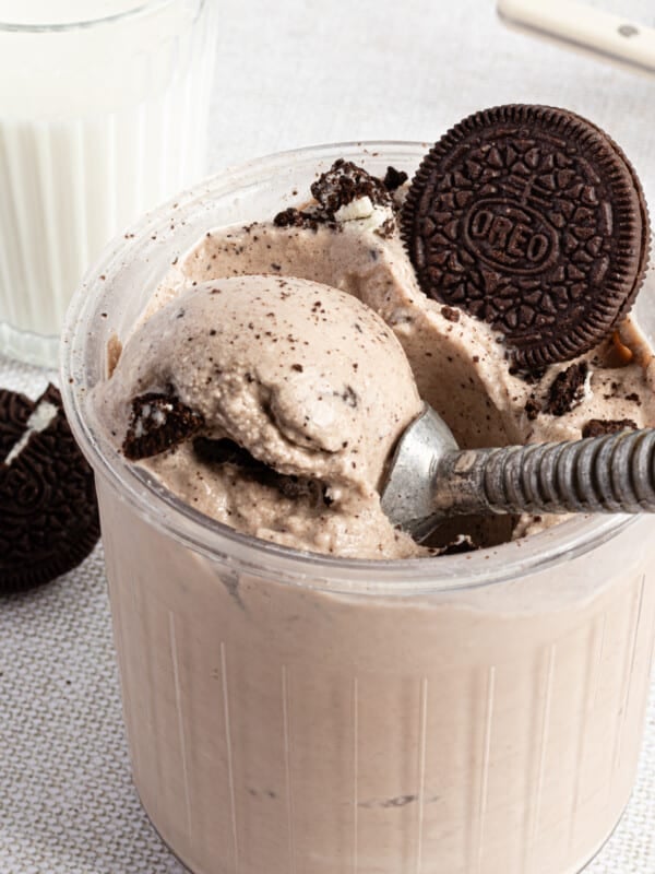 Ninja creami cookies and cream ice creaming a pint container.