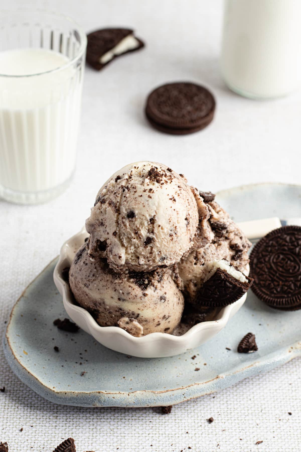 Ninja creami cookies and cream ice cream scooped in a bowl.