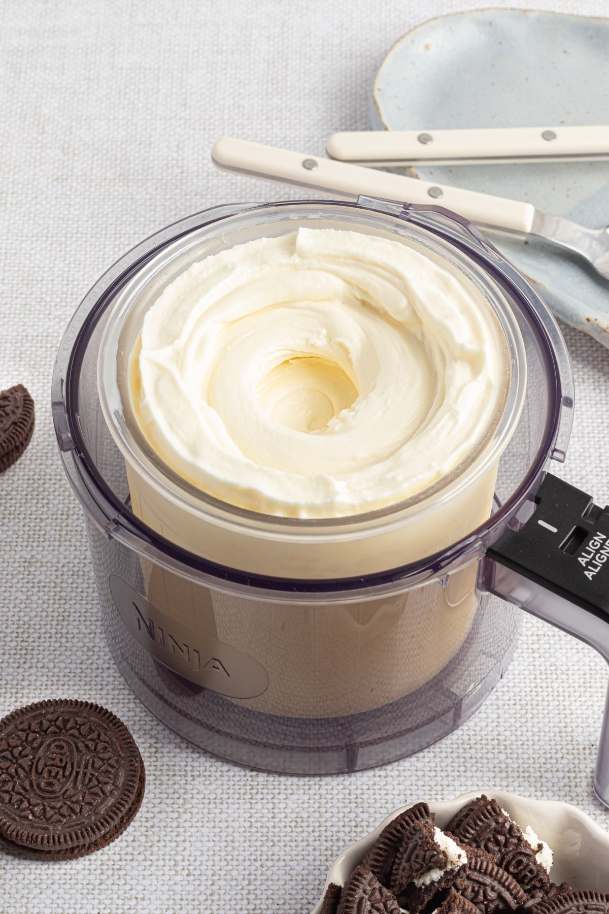 The base for cookies and cream ice cream in a ninja creami pint container.