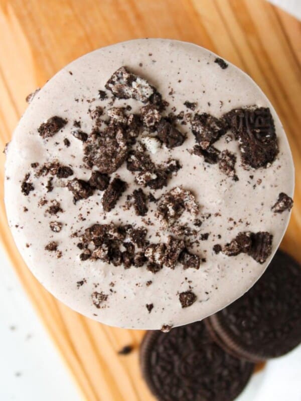 Overhead shot of an Oreo protein shake with Oreo pieces on top.