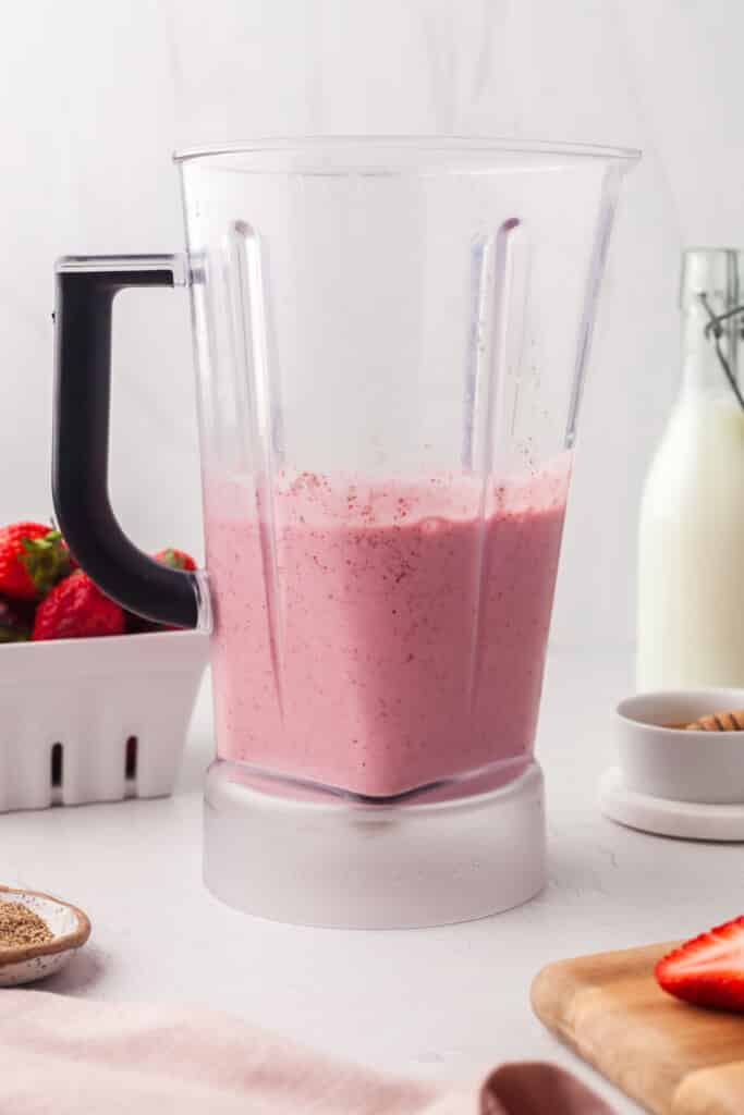 Cottage cheese smoothie blended in a blender.