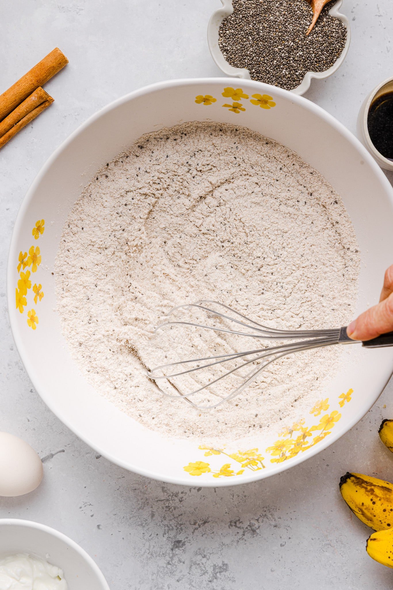 Dry ingredients for banana chia bread in a large bowl.