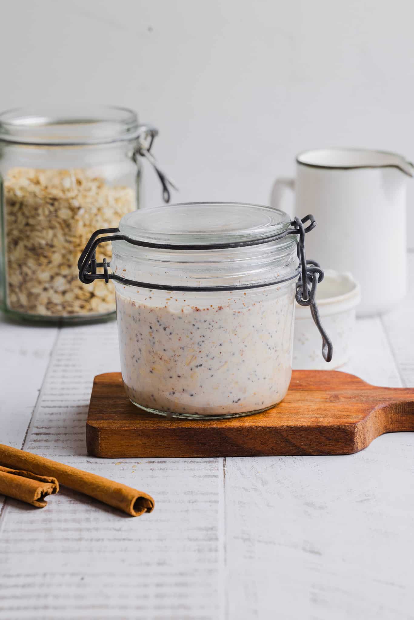 Maple brown sugar overnight oats in a glass jar with a lid. 