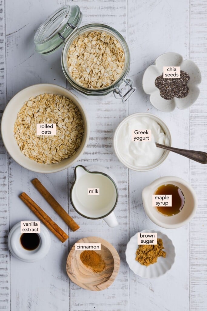 Ingredients for maple brown sugar overnight oats on a countertop with labels.