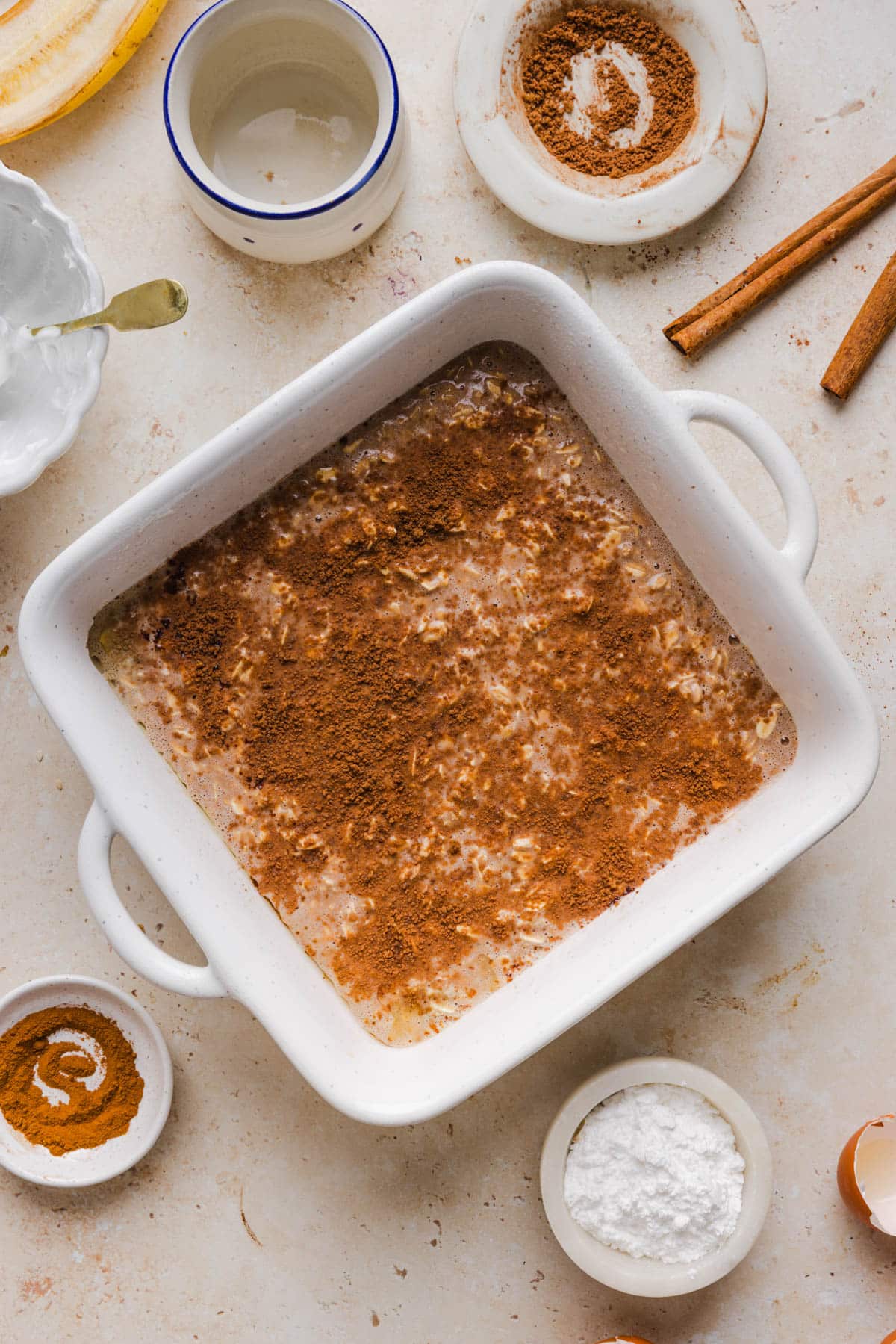 The oatmeal batter sprinkled with brown sugar before baking in the oven.