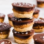 Three Twix bites stacked on a countertop.