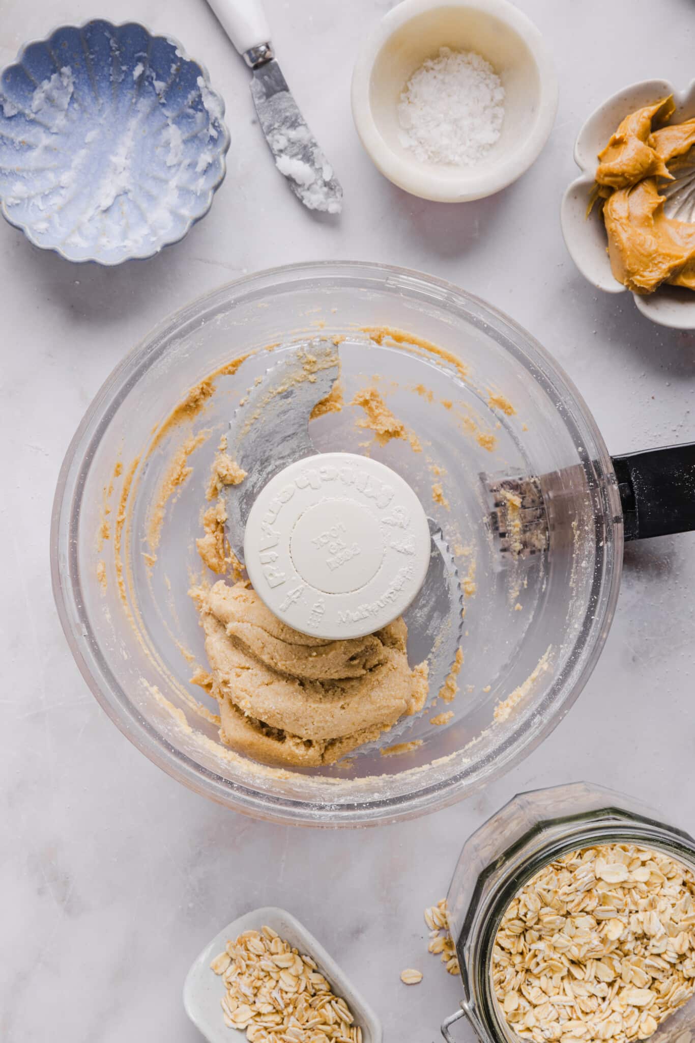 Oat flour shortbread mixture in a food processor.