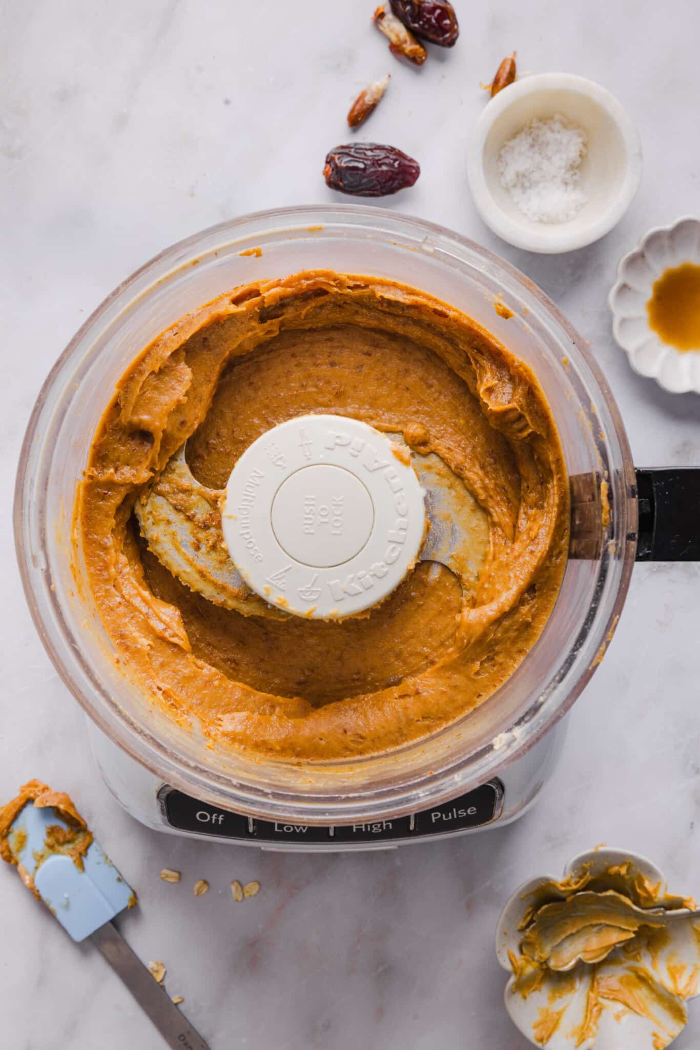 Date caramel for healthy Twix bites in a food processor.
