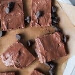 A close up shot of cottage cheese fudge with sprinkled chocolate chips.