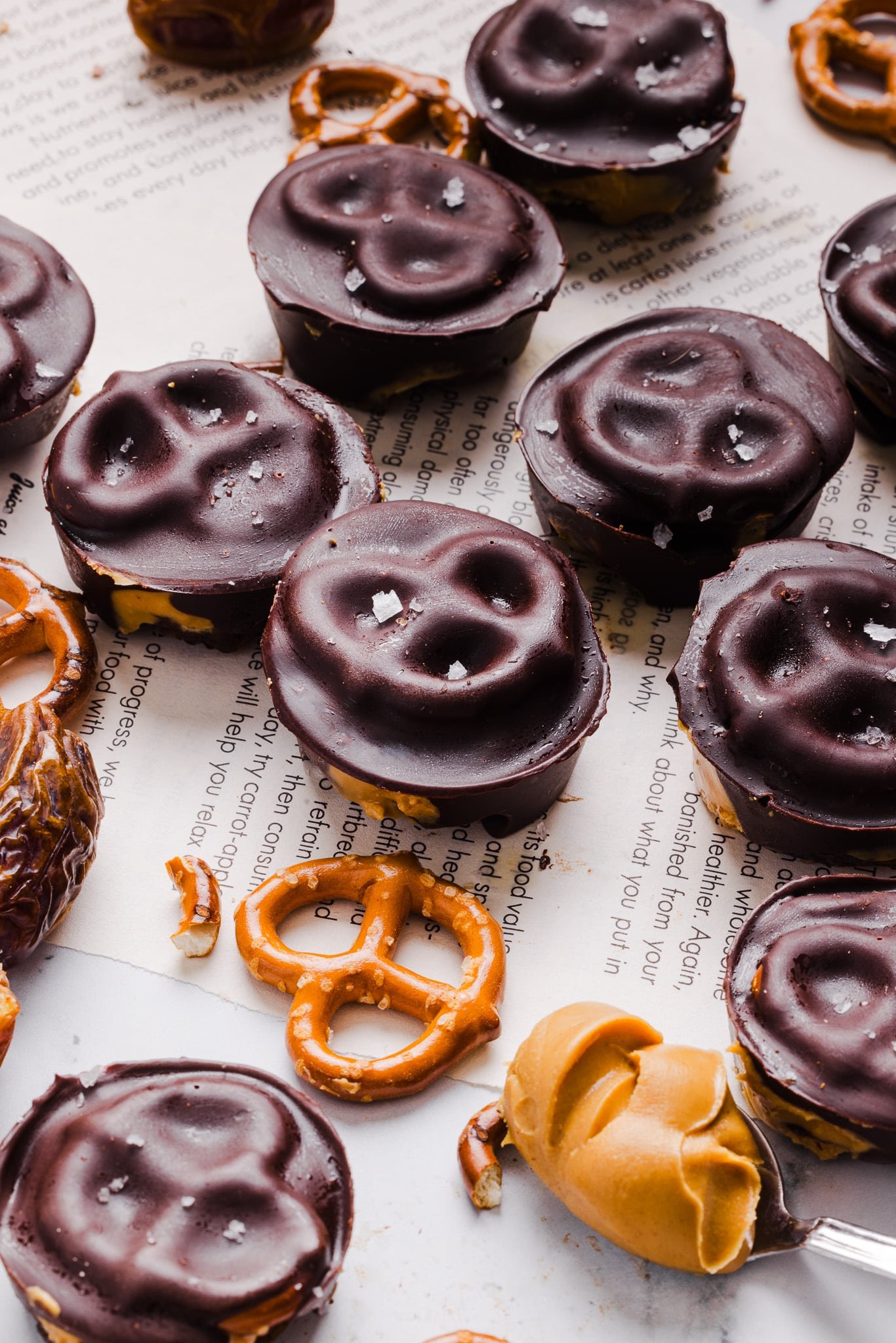 Peanut butter pretzel date bites on a table.