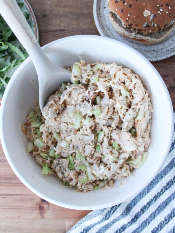 An overhead shot of 4-ingredient chicken salad in a cream bowl.