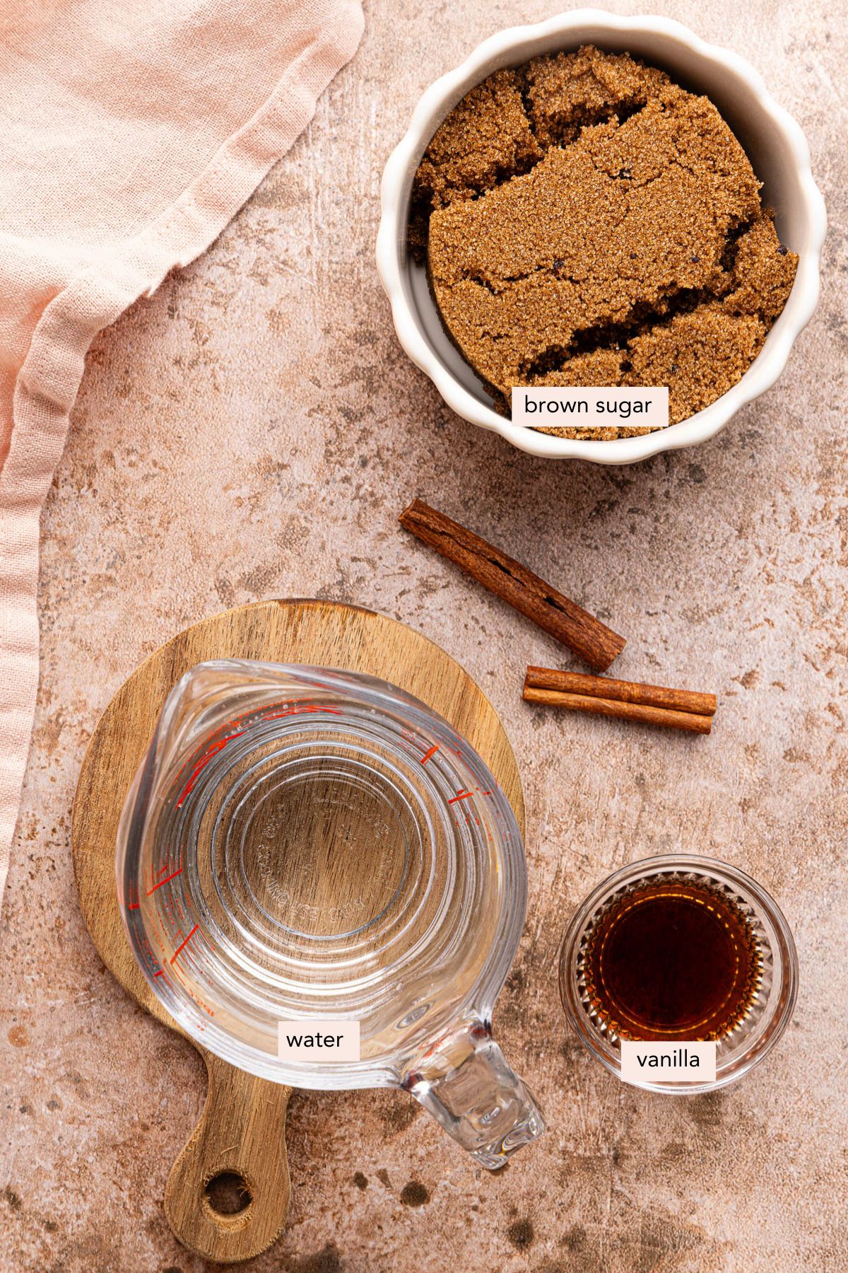 All of the ingredients for brown sugar simple syrup on a countertop.