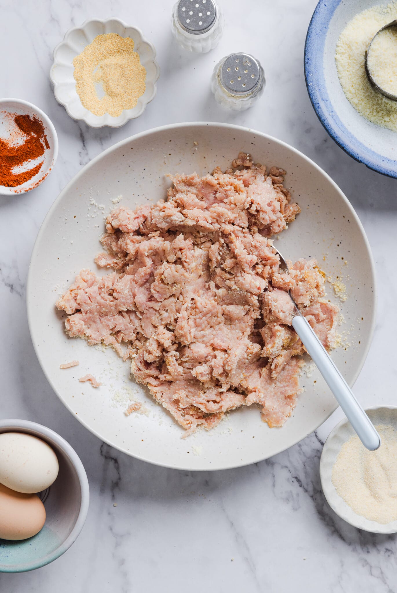 Ground chicken nugget mixture ready to be formed into nuggets in a bowl.