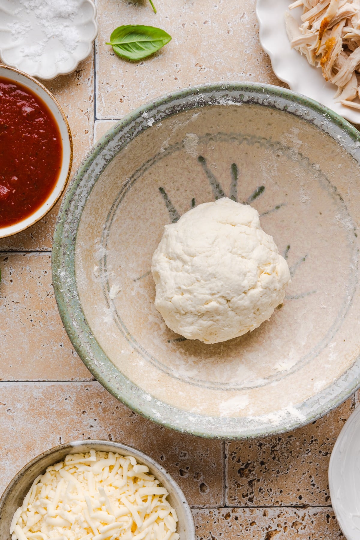 The dough ball in the bowl after mixing everything together.