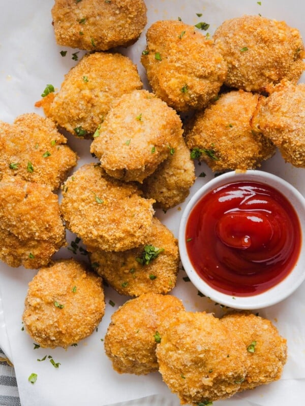 Homemade chicken nuggets made with ground chicken with ketchup.