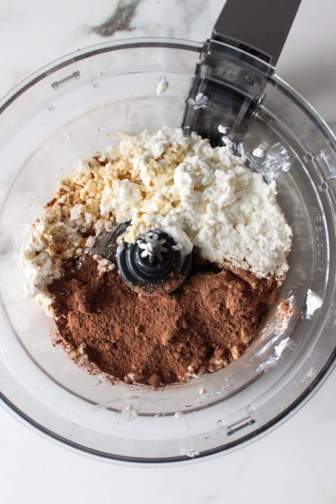 Cottage cheese, cocoa powder, honey, and vanilla extract 