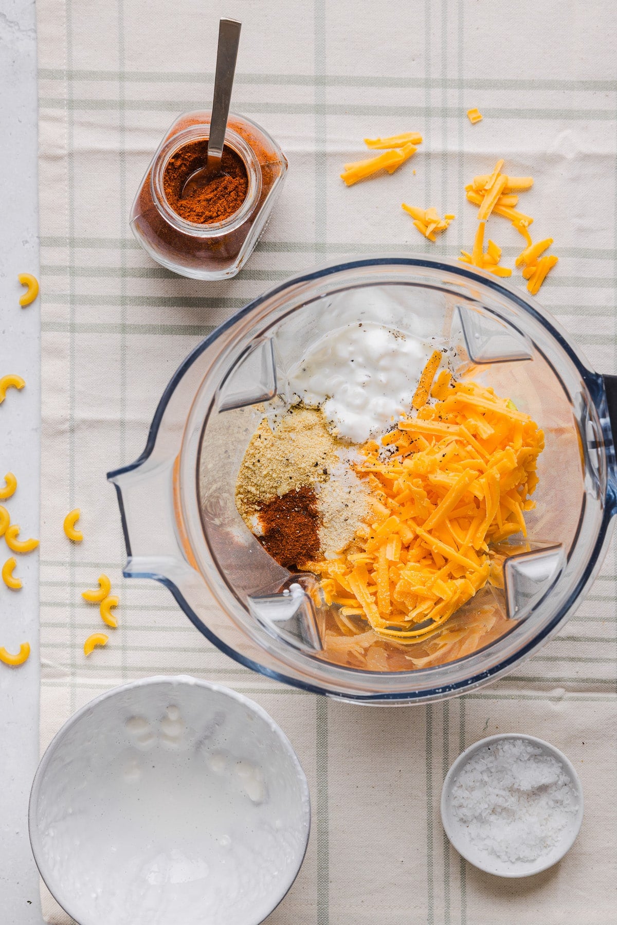 Ingredients for high protein Mac and cheese in a blender ready to be blended.