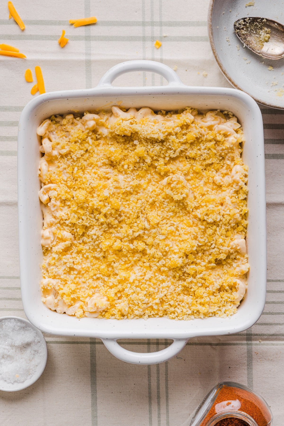 High protein Mac and cheese and breadcrumbs in a baking dish.