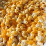 A close up shot of high protein mac and cheese in a casserole dish