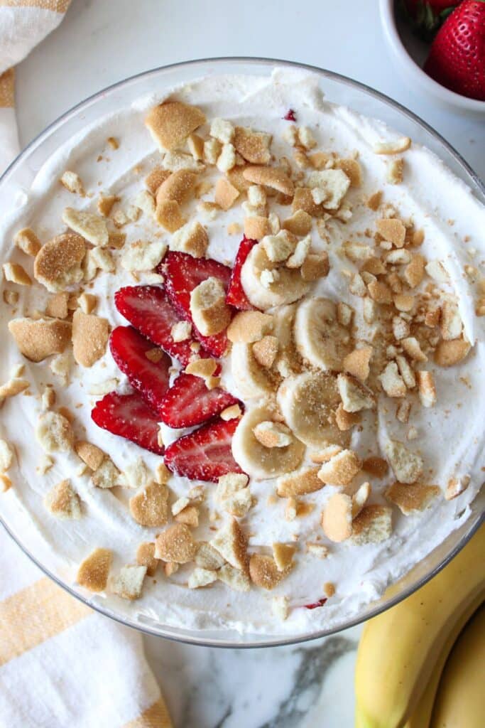 A large serving dish of strawberry banana pudding.
