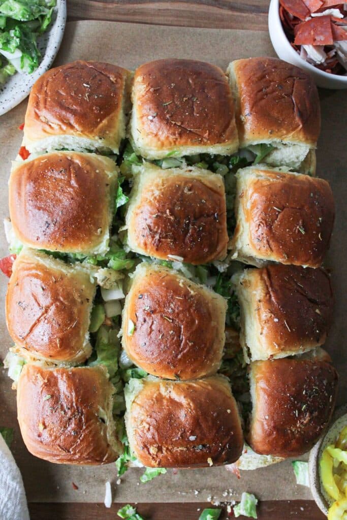 An overhead shot of sliced chopped italian sliders.