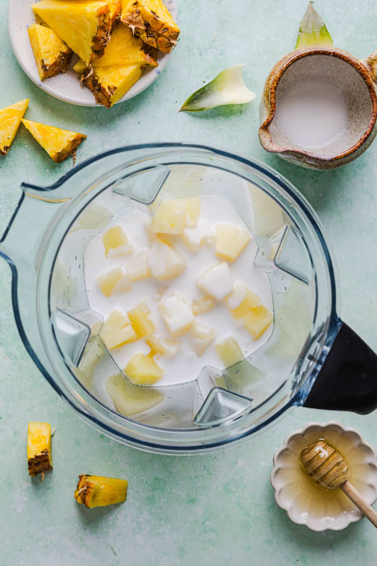 All of the ingredients for ninja creami dole whip in a blender before blending.