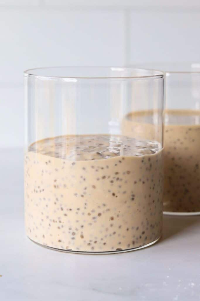 Coffee chia protein pudding after it has set in glass containers.