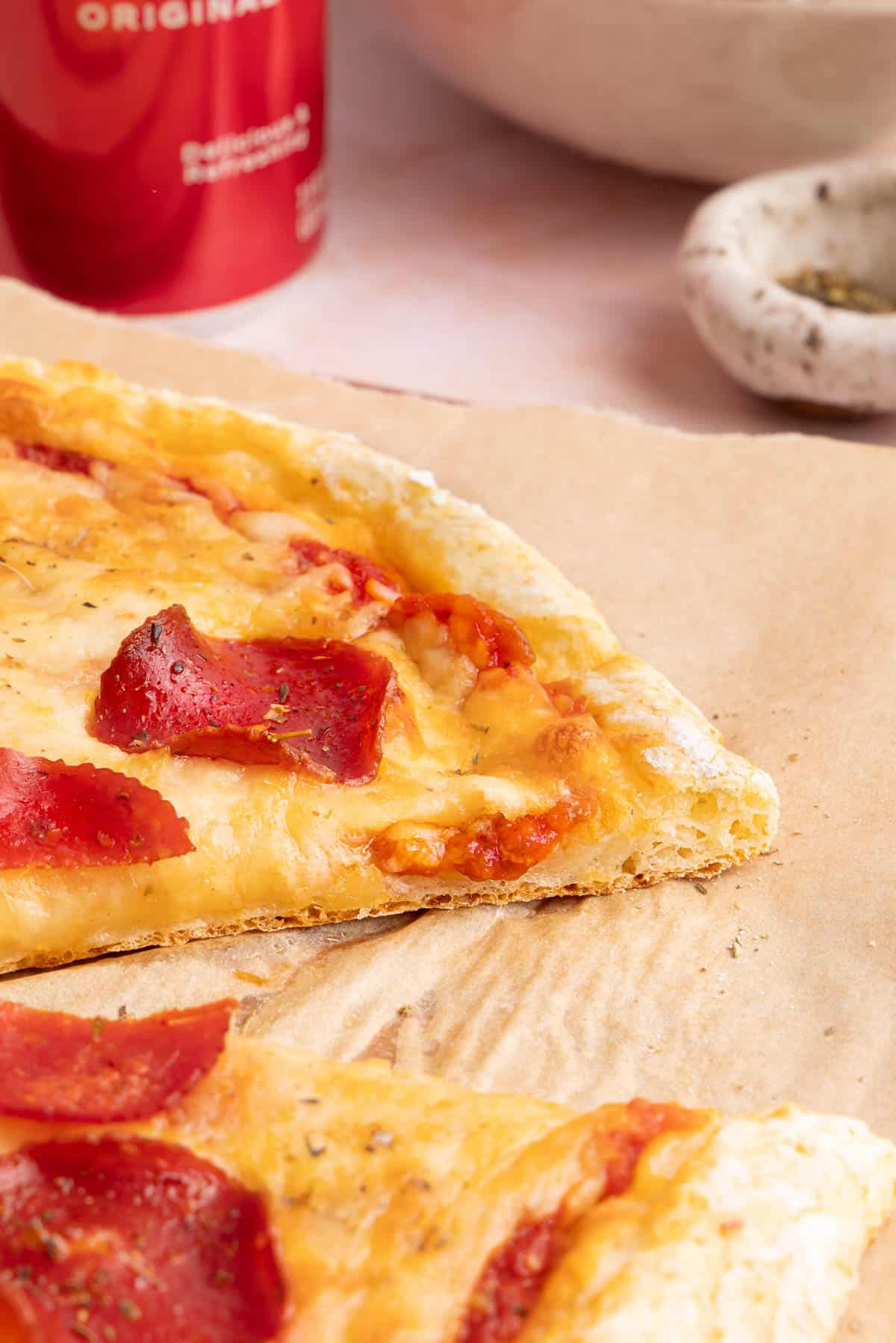 A close up photo of the side of the crust to show the texture of the crust.