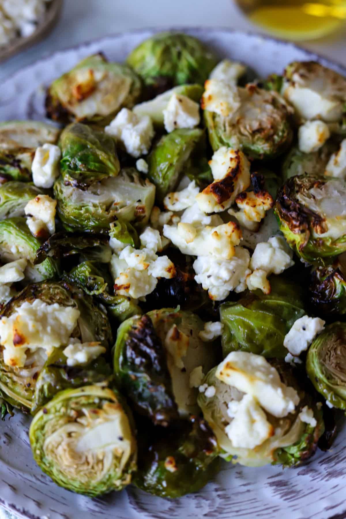 Crispy feta brussel sprouts on a plate.