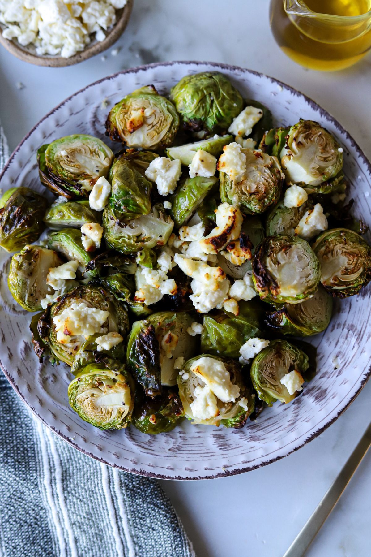 Crispy feta brussel sprouts on a plate.