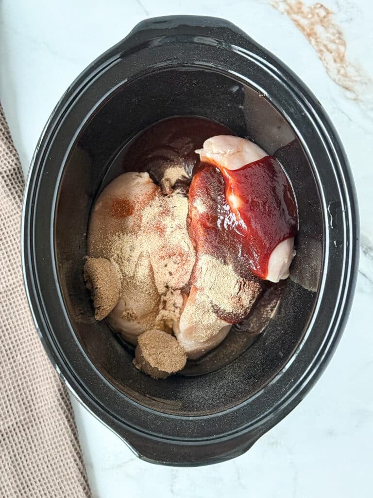 Ingredients for brown sugar bbq chicken in a crockpot.
