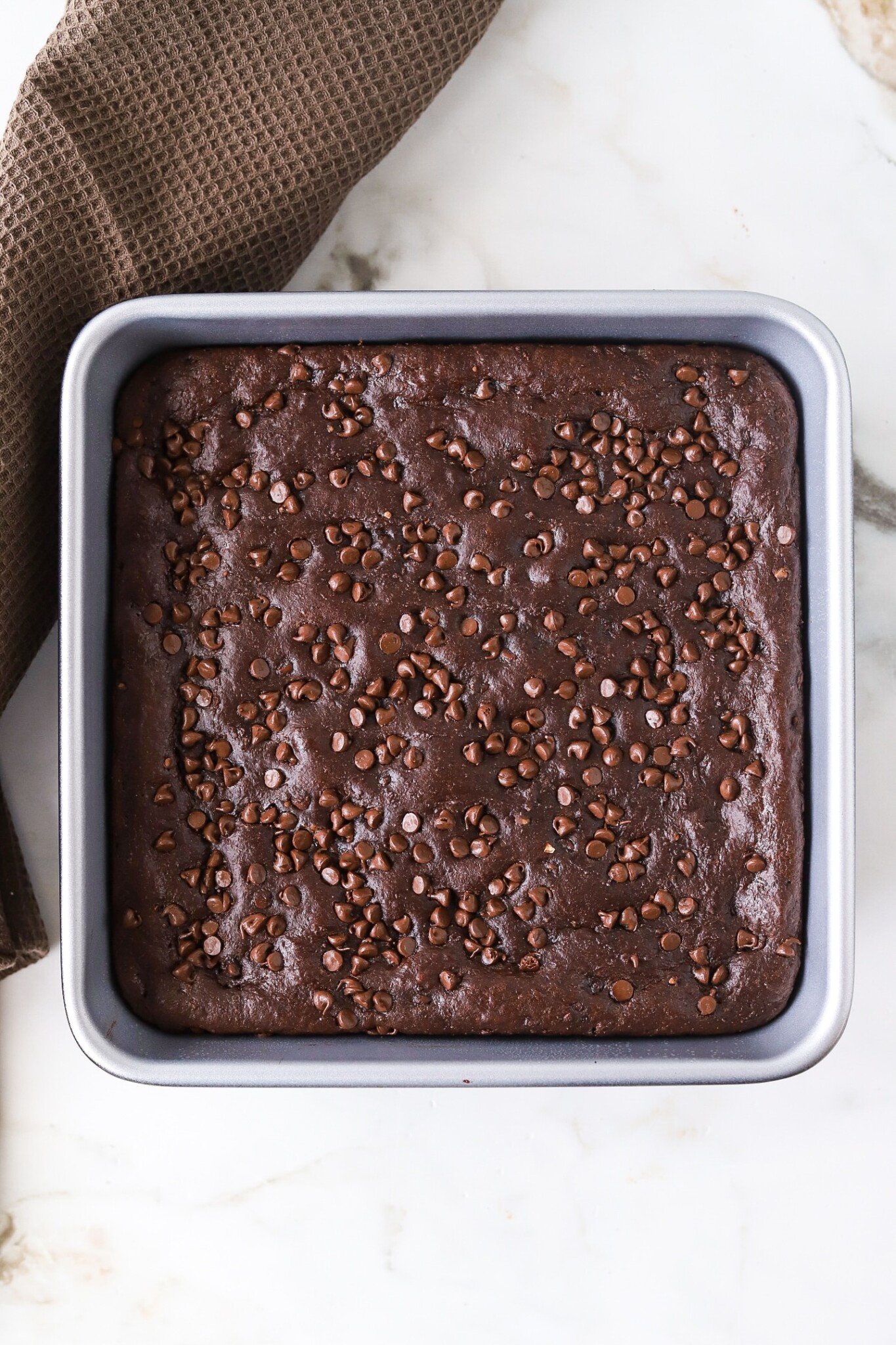 Cottage cheese brownies baked in a pan.