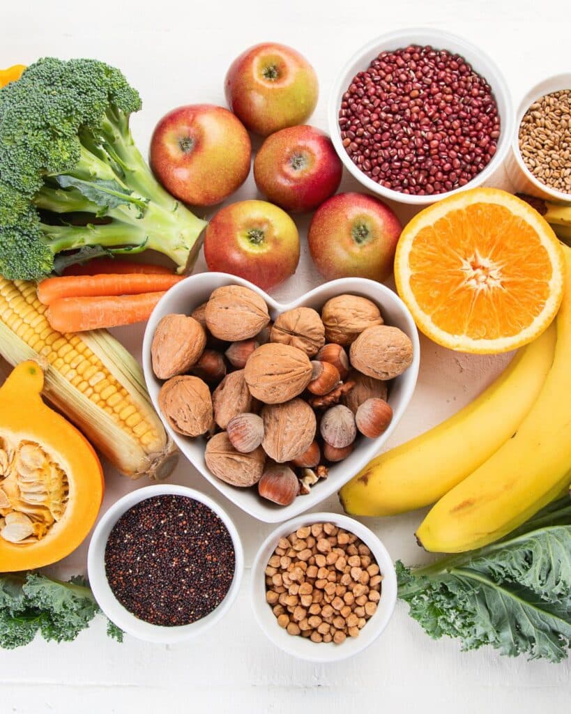 Fiber rich foods on a white background.