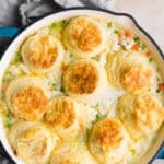 Finished turkey pot pie filling topped with golden brown biscuits.