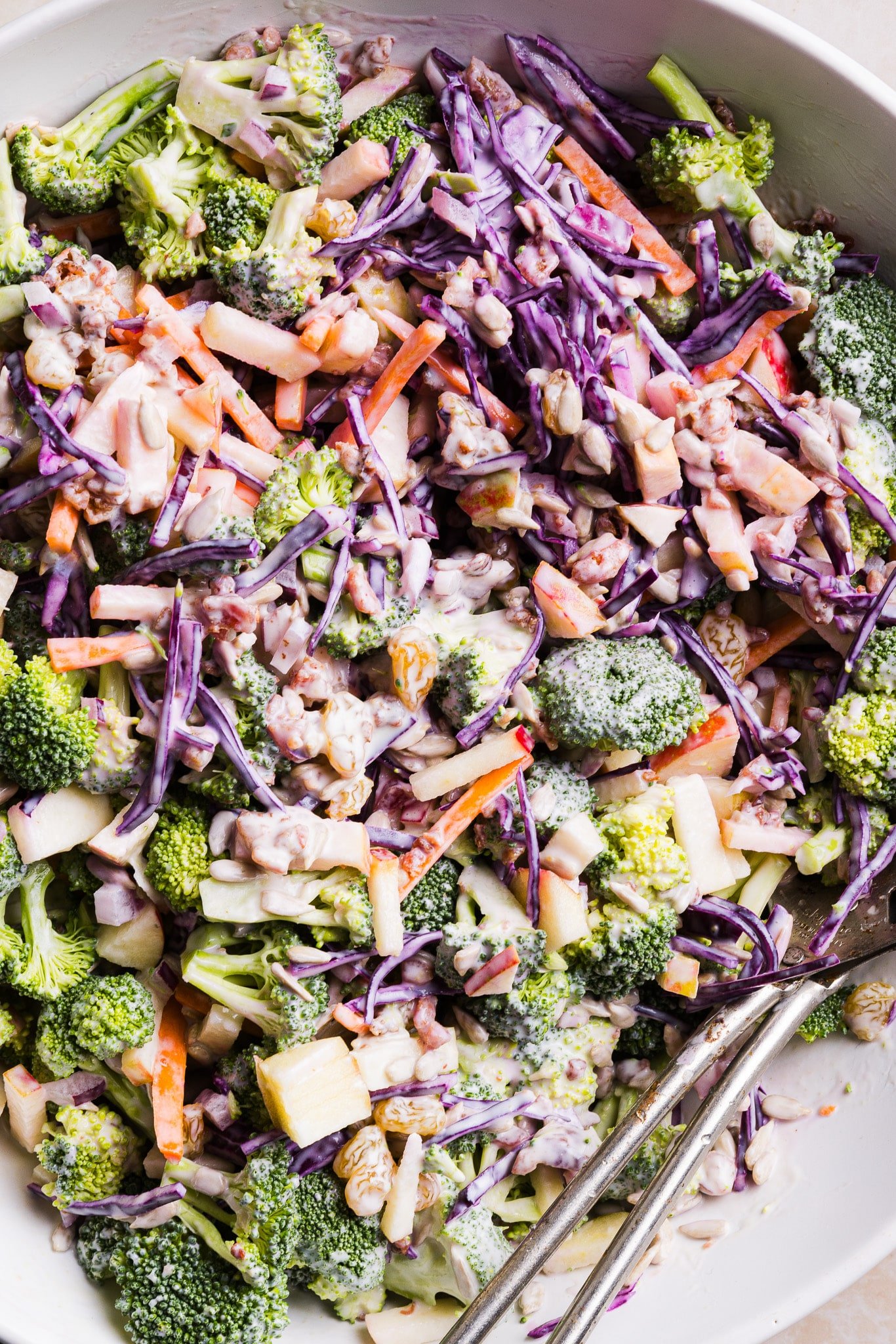 Broccoli crunch salad mixed in a bowl.