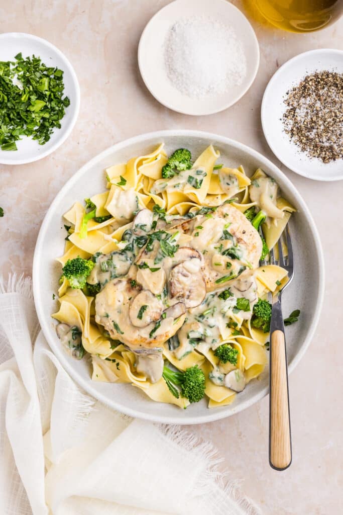Creamy garlic pork chops served over egg noodles.