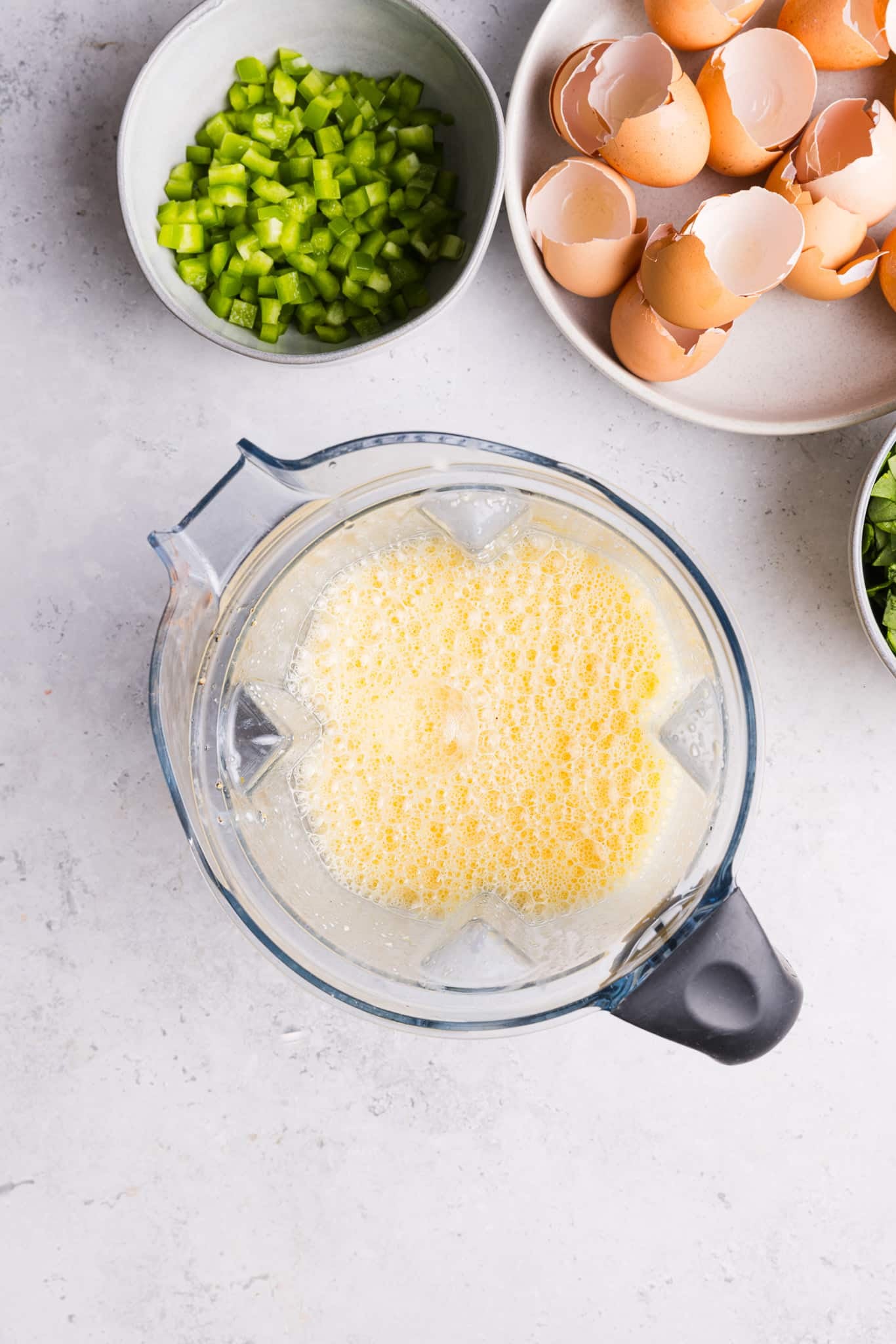 Sheet pan eggs in a food processor.