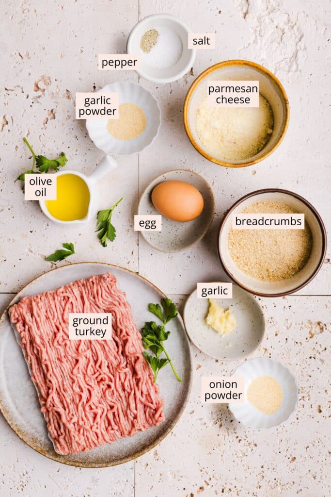 Ingredients for air fryer turkey meatballs on a countertop with labels