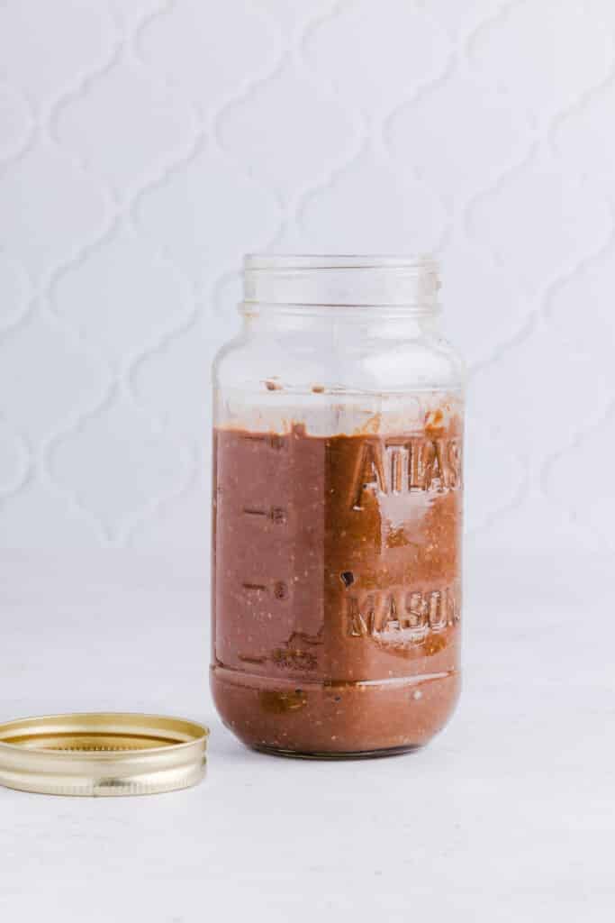Blended chia seed pudding in a jar.