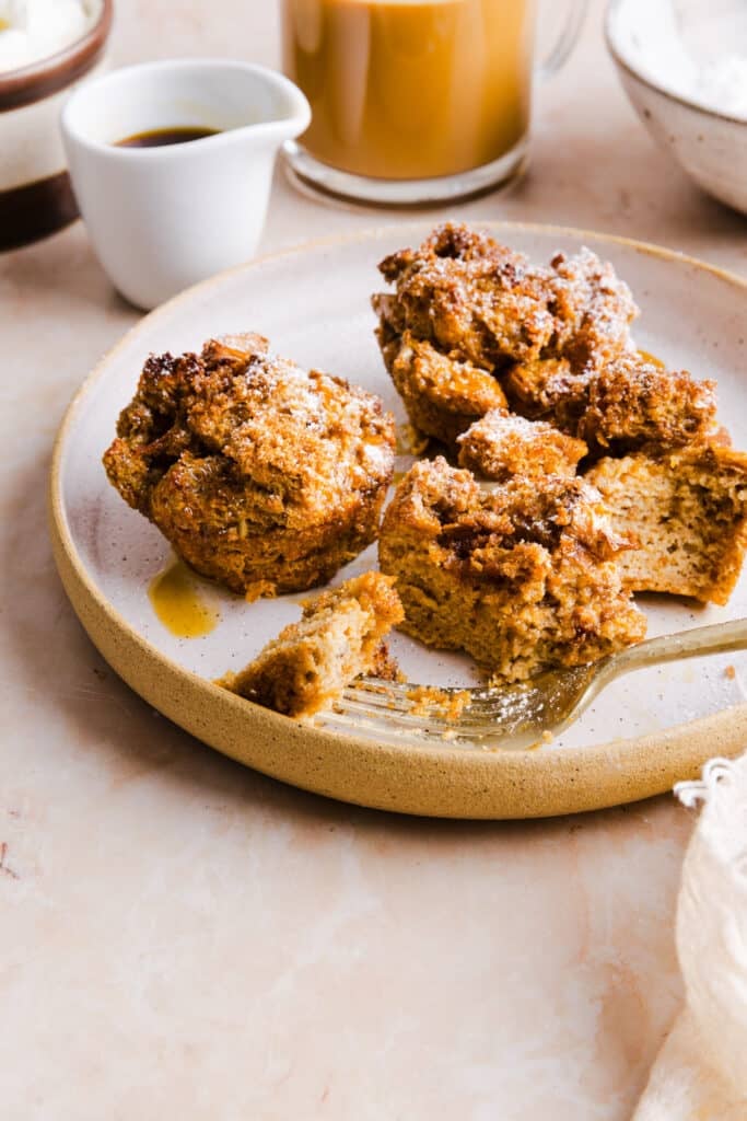 Cinnamon sugar French toast muffins on a plate with a fork.