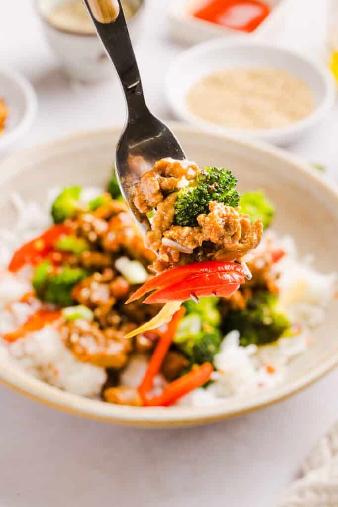 A forkful of firecracker ground chicken.