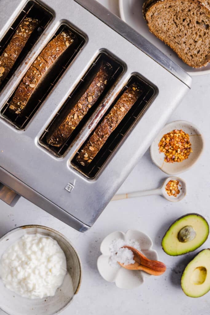 Whole wheat toast in a toaster.
