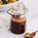 Maple balsamic dressing in a clear jar.